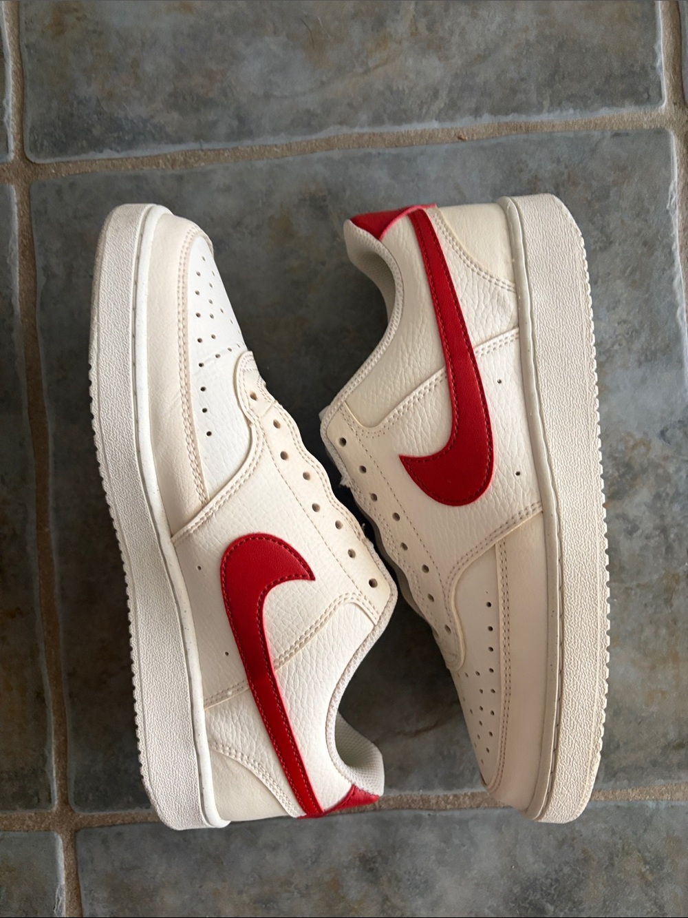 Nike Low-Top Sneakers in Cream with Red Swoosh